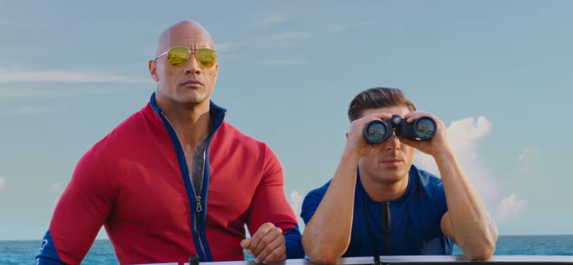 Baywatch con Dwayne Johnson e Zac Efron - Trailer italiano Rred Band