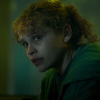 Iola Evans come Kayla in Choose or Die